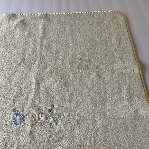 Carters Yellow Baby Blanket with the word Baby in Pastels and satin trim - Picture 1 of 11